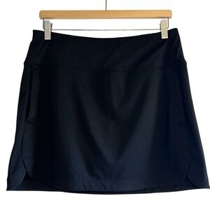 Athleta black tennis mini skort with built in shorts size M like new condition
